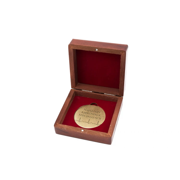 Messingmedaille in Holzkassette