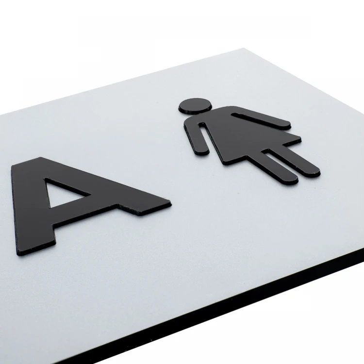 Tafel mit erhabenen Buchstaben und Braille-Schrift - Damen Toilette - Silbernes Laminat - Abmessungen 295x100mm - TAB504
